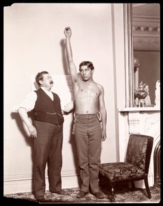 Professor Atkinson, an English Bone Setter, with a Male Patient